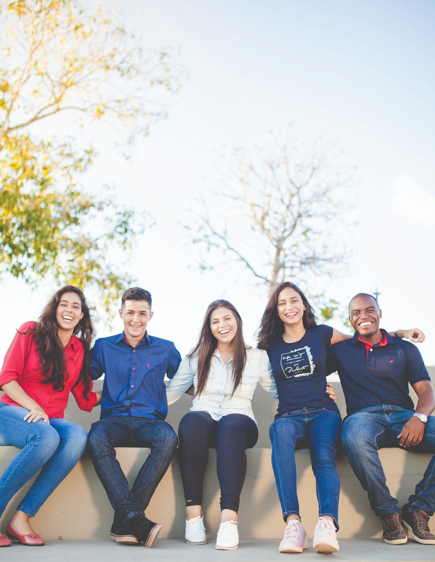 Diverse group of students smiling together